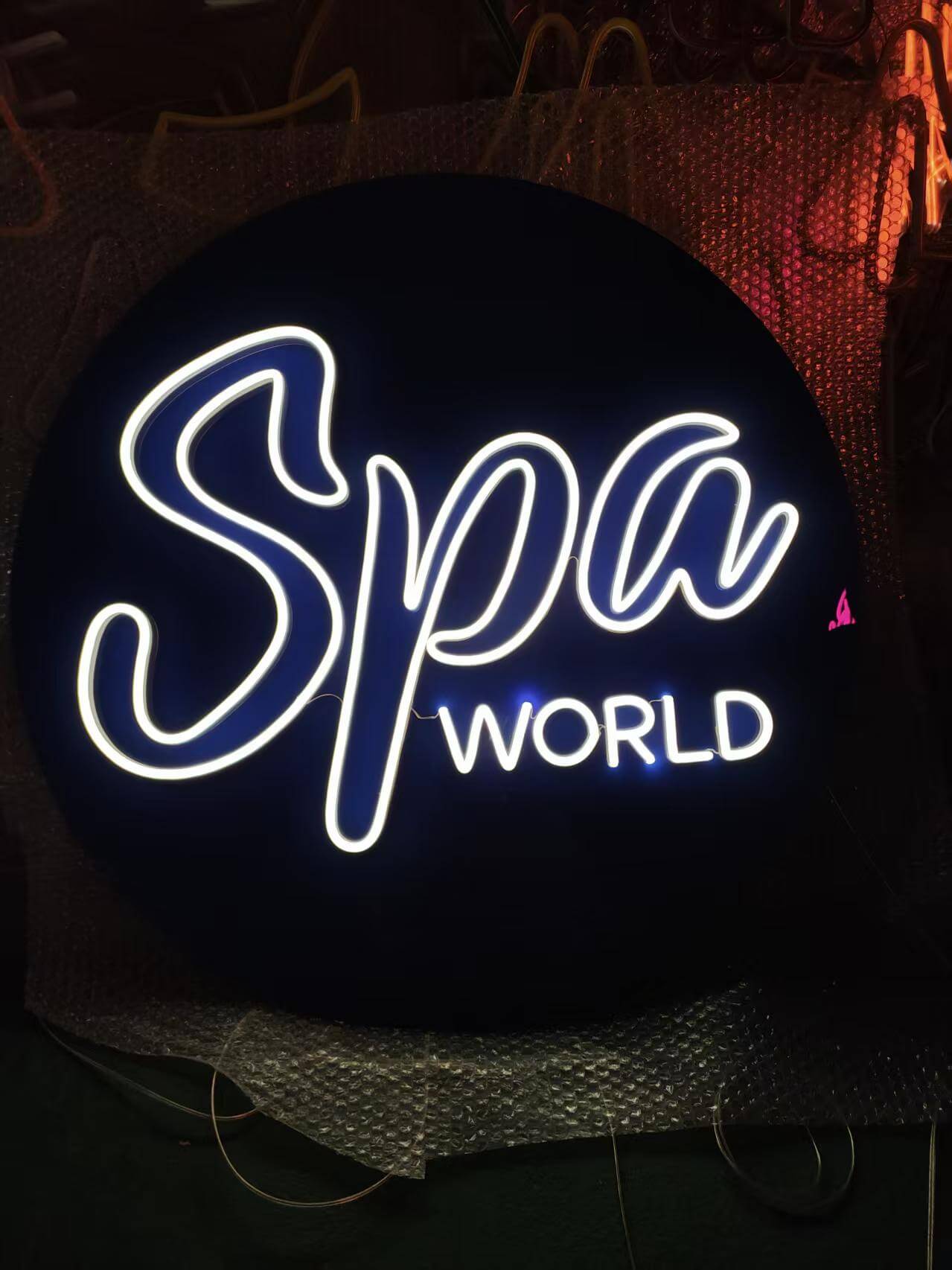 Custom made led neon sign for a spa with personalised logo