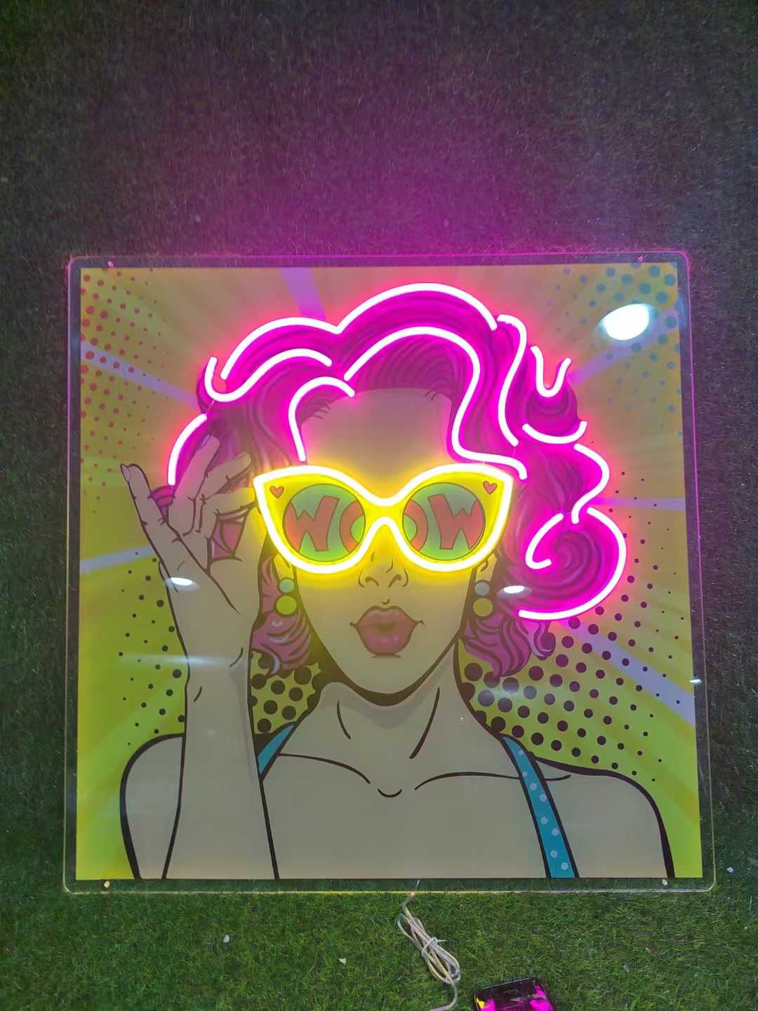 custom uv printed neon light with yellow and pink details with pop art graphics