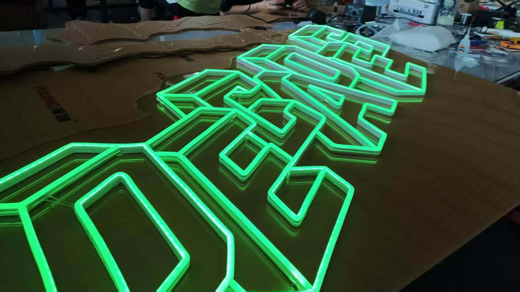 decade 3d neon sign in green for a business in perth