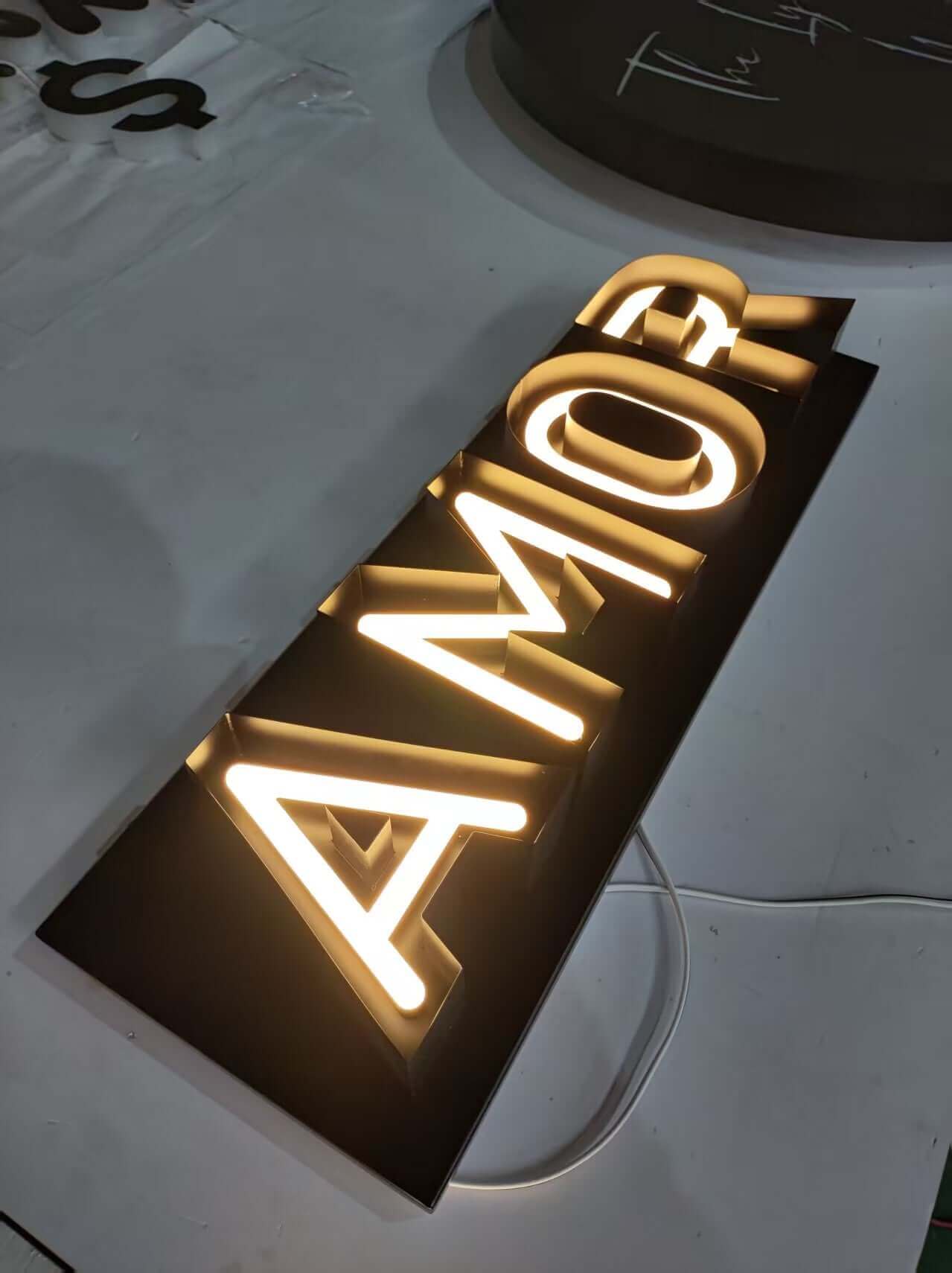 “Amor” LED neon sign with metal border casing