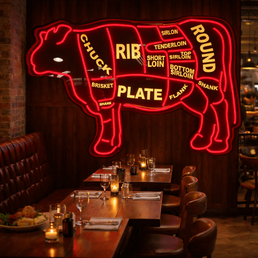 Custom LED neon sign displaying different cow steak cut names for steakhouse décor