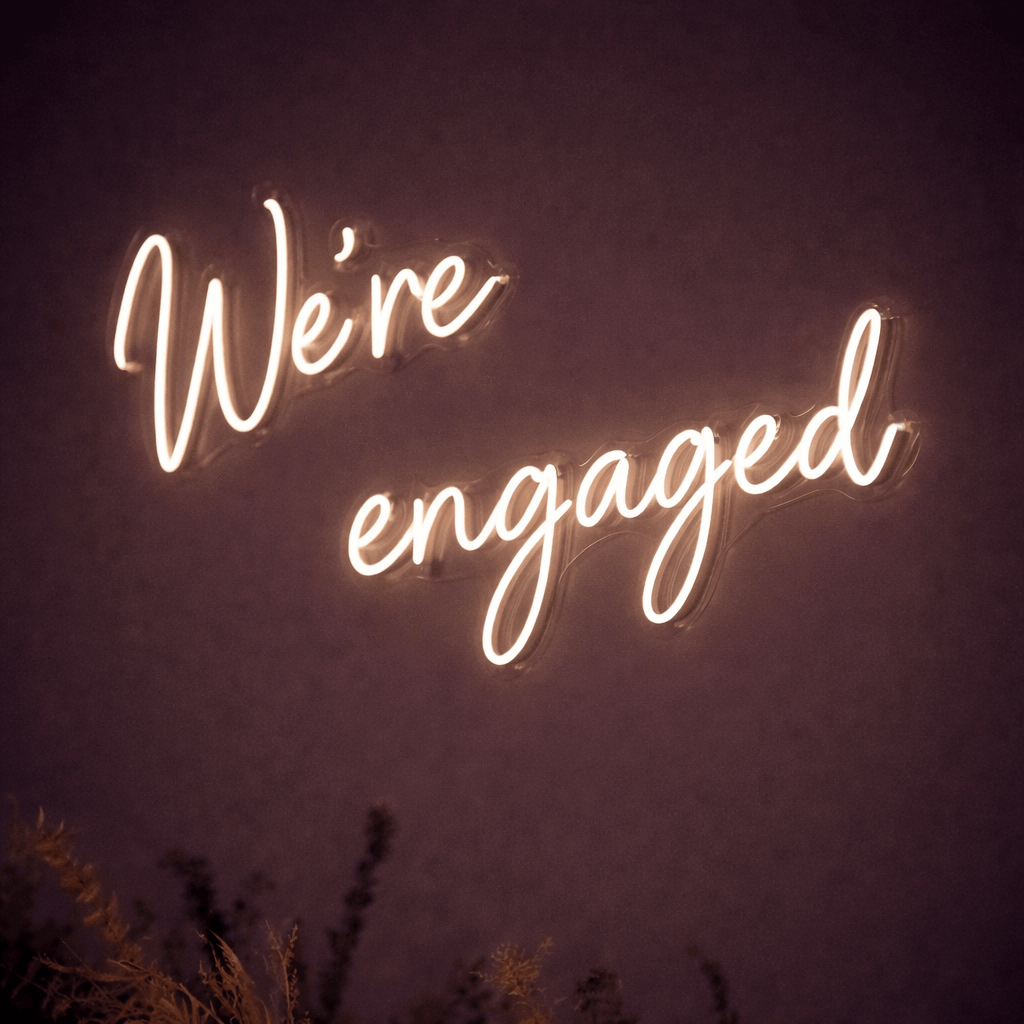 “We’re Engaged” white LED neon sign for engagement celebrations