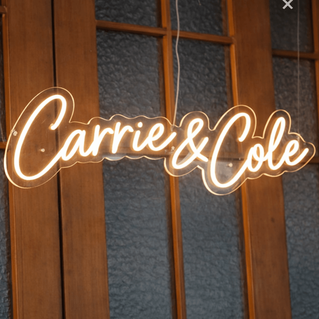 custom wedding neon sign for carrie & cole in warm white